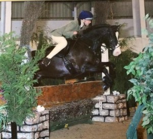 Molly and Johnny Cash jumping in their Elevation Pony at the NPS Winter Championship 2014